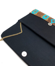 GOLD AND TURQUOISE IKAT PRINT BEADED CLUTCH